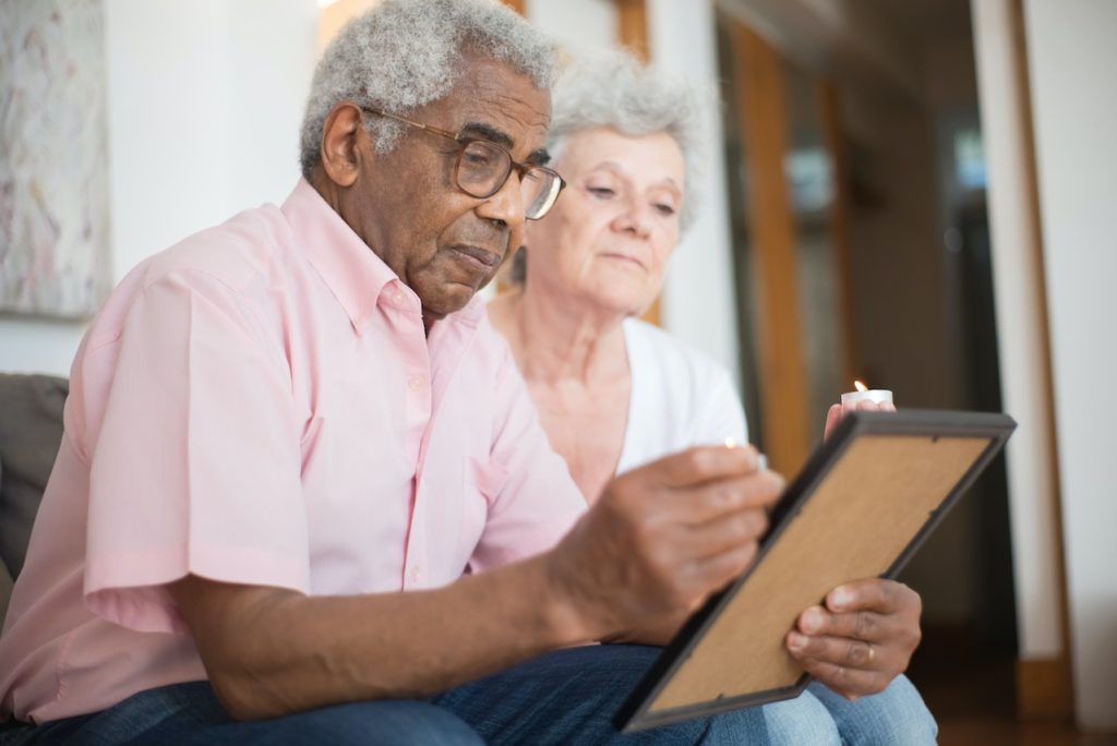 two old people losing a loved one