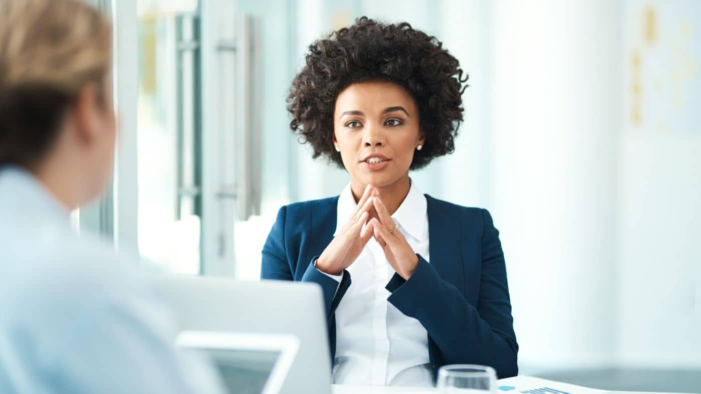 A lawyer giving advice to an employee about their rights in the workplace