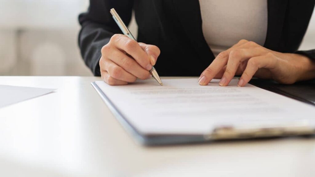 A picture of a person preparing documents for a personal injury mediation