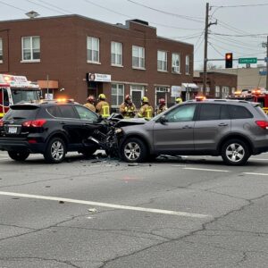 T-Bone car accident scene at an intersection with emergency responders