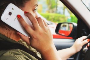 distracted driving woman on cellphone