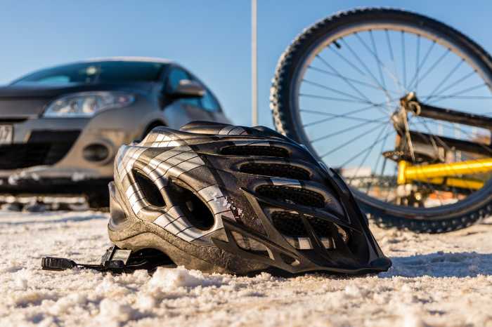 A bicycle hit by a car